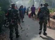 Babinsa Koramil 1413-01/Wolio Gelar Kerja Bakti Bersihkan Kiri Kanan Jalan Demi Ciptakan Lingkungan Bersih dan Sehat