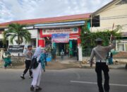 Propam Polres Banggai Bantu Kelancaran Lalu Lintas dan Keselamatan Pelajar di Depan Sekolah