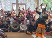 Kapolsek hadiri Pesta Adat Acara Maccera Manurung Di Desa Pasang Kec. Maiwa Kab. Enrekang