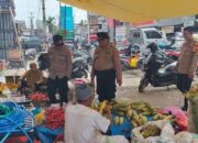 Pengamanan Pasar Sentral Cabenge, Polsek Lilirilau Pastikan Arus Lalu Lintas dan Keamanan Pengunjung Tetap Kondusif
