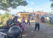 Bhabinkamtibmas Polsek Ganra Laksanakan Pengamanan dan Pengaturan Lalu Lintas di Pasar Ganra