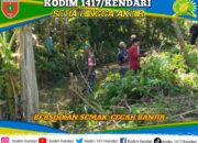 Antisipasi Banjir, Personel Koramil Wawotobi Bersama Warga Bersihkan Saluran Air