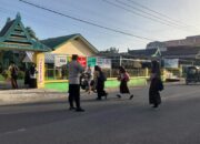 Polsek Marioriawa dan Polsek Marioriwawo Laksanakan Pengaturan Lalu Lintas Pagi Hari Demi Keamanan Pengguna Jalan