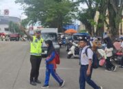 Pengaturan Siang Sat Lantas Polres Sinjai, Ciptakan Lalu Lintas Aman Kondusif Bagi Masyarakat