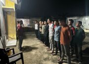 Personel Satgas TMMD 127 Kodim 1417/Kendari Gelar Apel Malam Usai Rampungkan Target Harian