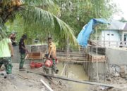 Satgas TMMD Percepat Pengecoran Jembatan di Tengah Tantangan Alam