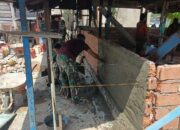 Satgas TMMD 127 Kodim 1417/Kendari Percepat Pengerjaan Dinding RTLH di Petoaha