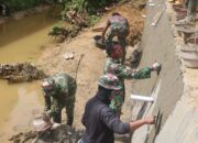 Satgas TMMD 127 Kodim Kendari Percepat Pengerjaan Plaster Dinding Talud