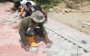 Menyusun Harapan di Atas Paving Blok: Wajah Baru Desa Melalui TMMD 127 Kodim 1417/Kdi