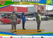 Babinsa Koramil Lainea Jaga Kenyamanan Mudik di Pos Terpadu Punggaluku