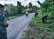 Sinergi TNI dan Warga, Koramil Batauga Gelar Kerja Bakti Bersihkan Drainase Lingkungan