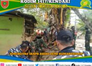 Sinergitas Tanpa Batas Demi Kemanusiaan, Personil Kodim 1417/Kendari Dengan Sigap Bersihkan Sisa Banjir di Lepo-Lepo