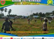 Sinergi TNI dan Warga, Babinsa Koramil 1417-04/Lainea Bersihkan Lapangan Sepak Bola Desa Ampera