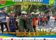 Wujudkan Lingkungan Aman, Koramil 1417-08/Mandonga Turut Hadiri Kerja Bakti Bersihkan Ranting Pohon di Jalan Sam Ratulangi