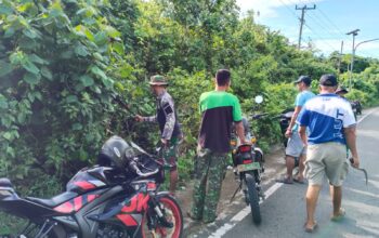 Ciptakan Jalan Bersih dan Aman, Anggota Koramil 1413-11/Wangi-Wangi Kerja Bakti Bersama Warga