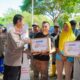 Hari Bhayangkara, Polres Banggai Bagikan Sembako di Area Tempat Pembuangan Akhir