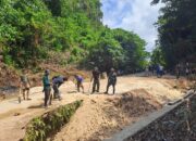 Penimbunan Material Talud Mantapkan Percepatan Sasaran Fisik TMMD Ke-129 Kodim 1413/Buton